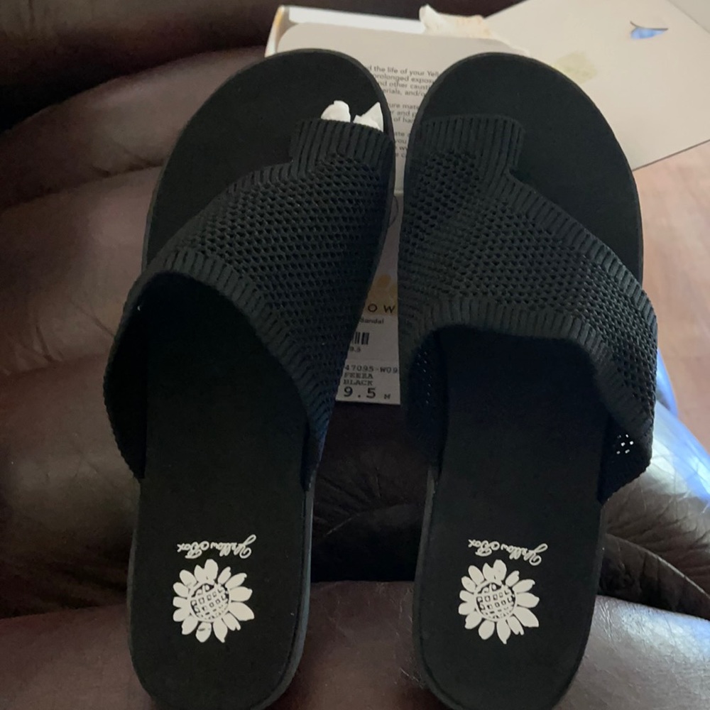 A new pair of yellow box sandals